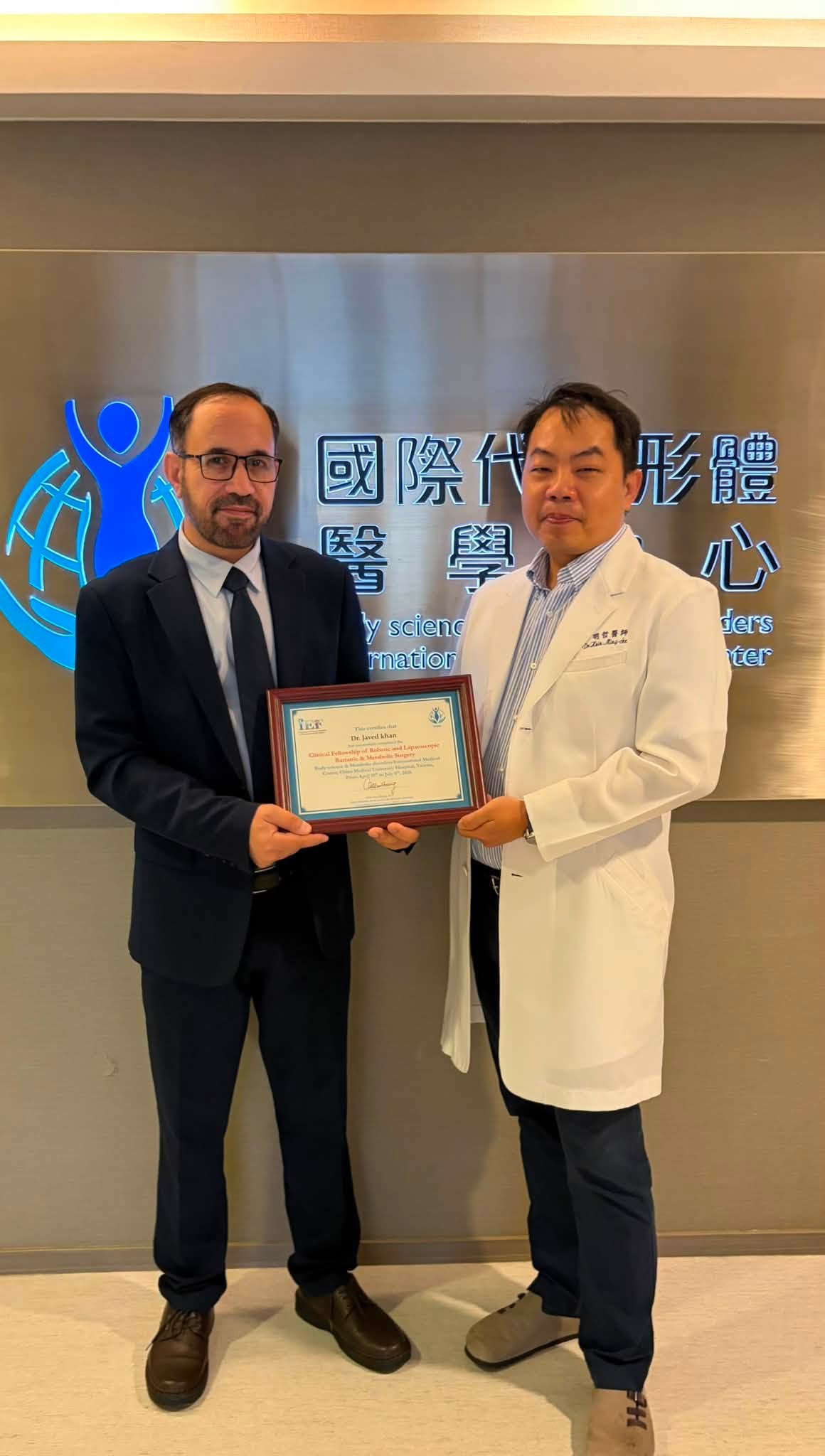 Dr Javed Khan receiving professional recognition